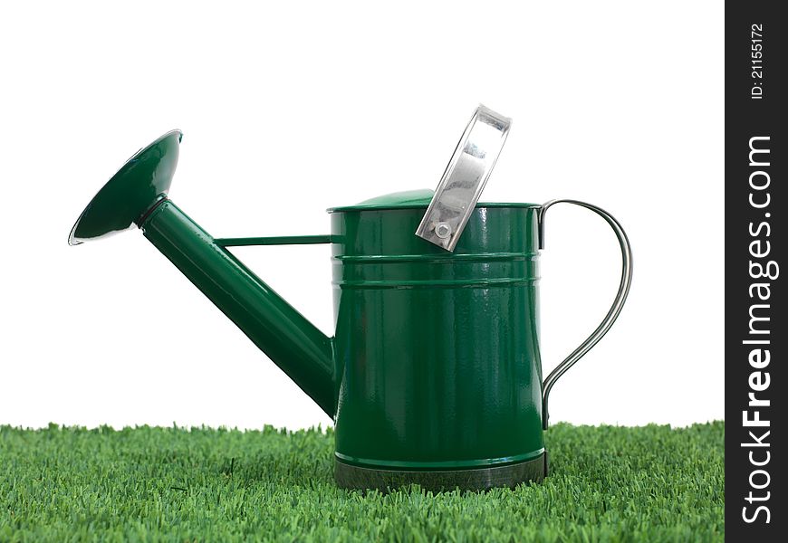 A watering can  against a white background