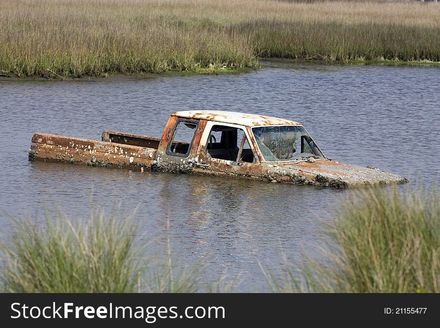 Deep in southern Louisiana, I came across this truck in the water which was more than likely a victim of Hurricane Katrina.