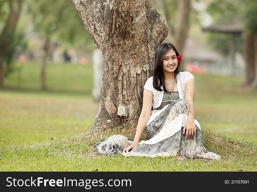 A portrait of a beautiful young asian woman outdoor