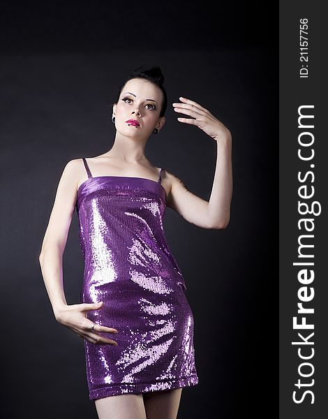 Beautiful girl in purple dress