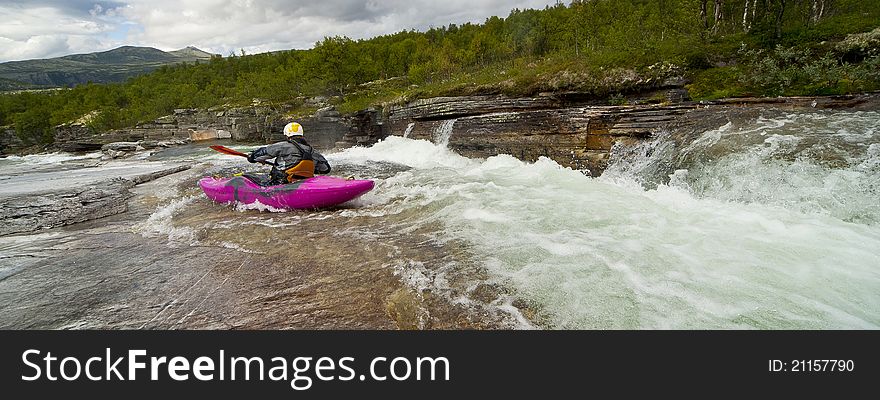 Kayaker jumping from the waterfall. Kayaker jumping from the waterfall