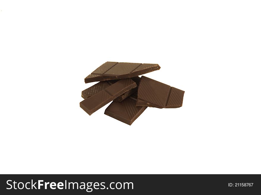 Sections of chocolate on the white background
