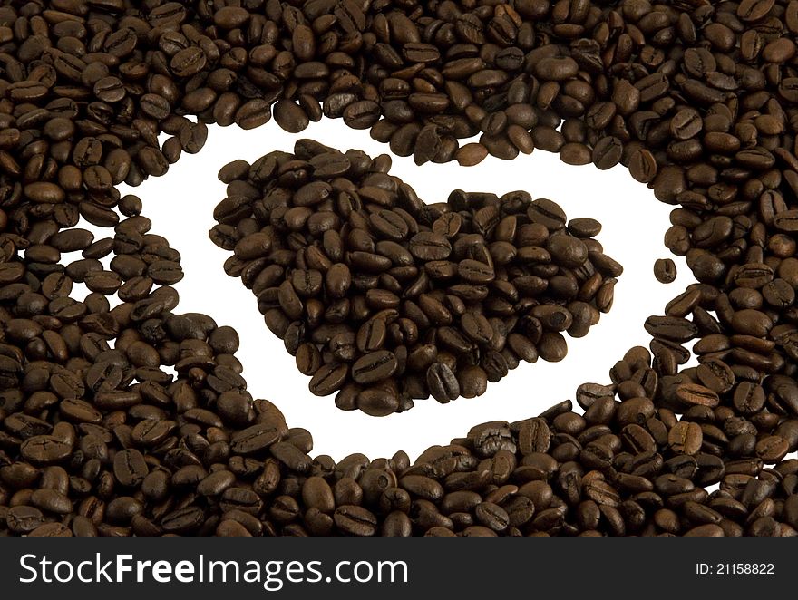 Coffee beans background with the heart. Coffee beans background with the heart