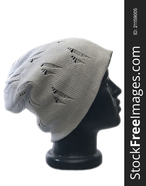 Fashionable gray hat on the mannequin, isolated