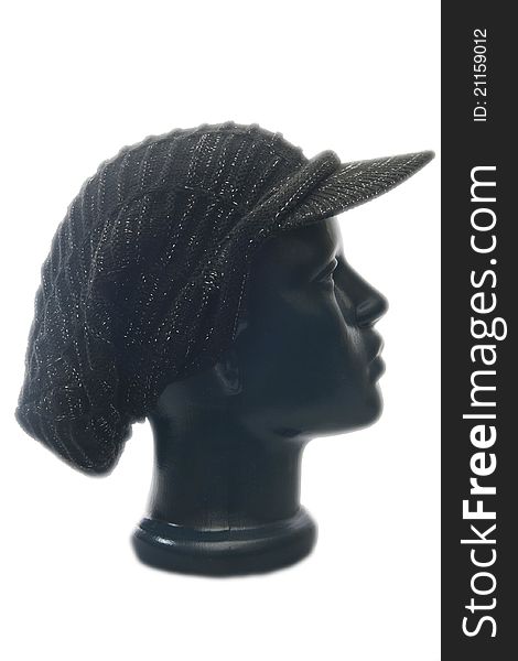 Fashionable black hat on the mannequin, isolated