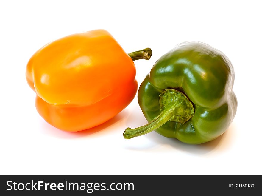 Sweet pepper with a shadow on a white background