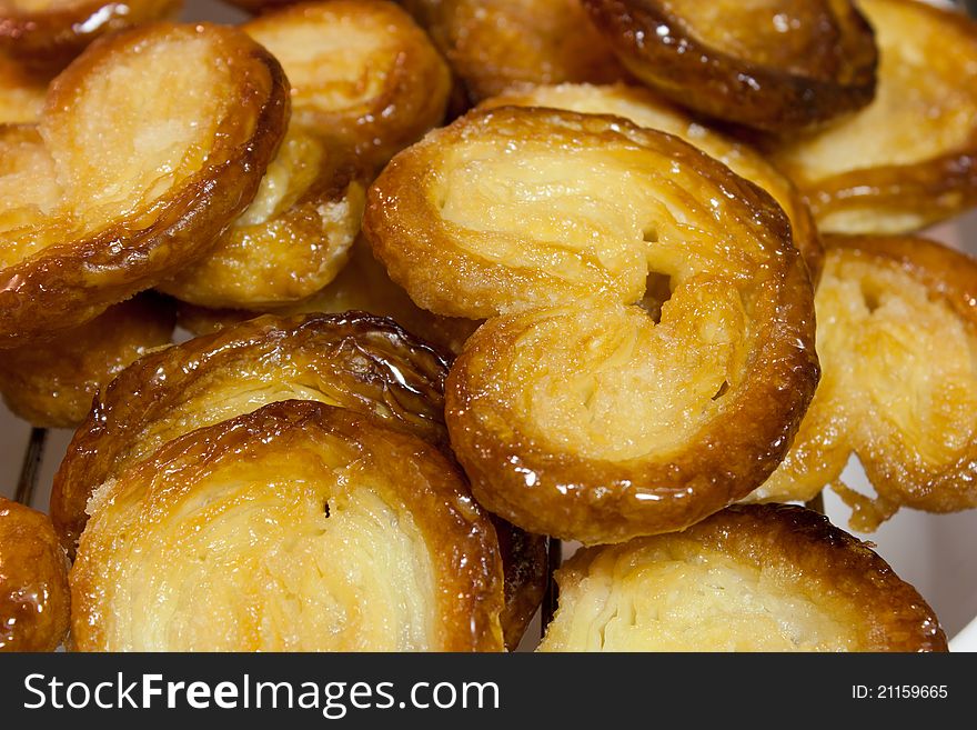 Homemade puff pastry cookies with caramelized sugar