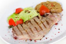 Pork Chop, Grilled ,with Salad,bun And Tomato Royalty Free Stock Photos Pork Chop, Grilled ,with Salad,bun And Tomato Royalty Free Stock Photos