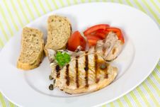 Pork Chop, Grilled ,with Salad,bun And Tomato Stock Images Pork Chop, Grilled ,with Salad,bun And Tomato Stock Images
