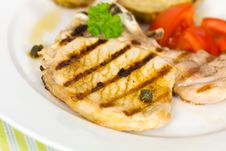 Pork Chop, Grilled ,with Salad,bun And Tomato Royalty Free Stock Photography Pork Chop, Grilled ,with Salad,bun And Tomato Royalty Free Stock Photography