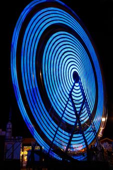 Ferris Wheel Electric Blue Color At Night Stock Photos