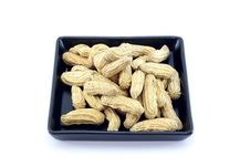 Peanut On Black Plate Isolated Stock Image Peanut On Black Plate Isolated Stock Image