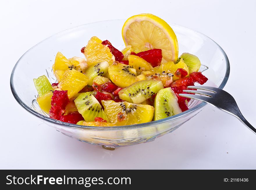 Fruit salad is a dish consisting of various kinds of fruit, served in a liquid, either in their own juices or a syrup.