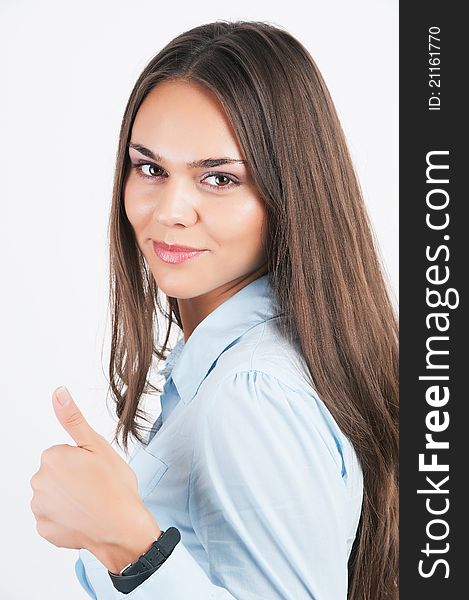 Happy smiling business woman showing thumbs up gesture, on white background