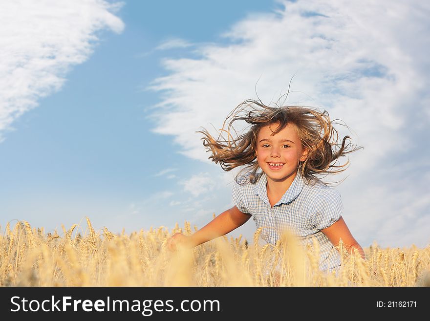 Happy young girl on natural background