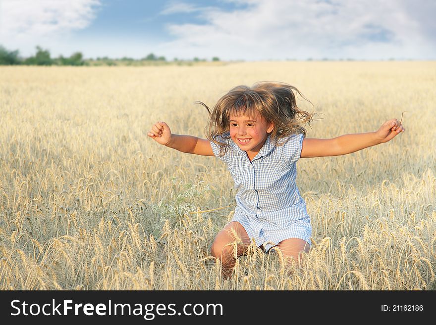 Happy young girl in yellow field. Happy young girl in yellow field