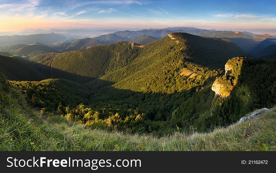 The mountain autumn landscape with colorful forest