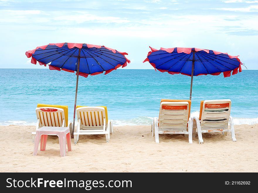 Beach chair. Sunbathing on the beach at the resort during the summer season looks