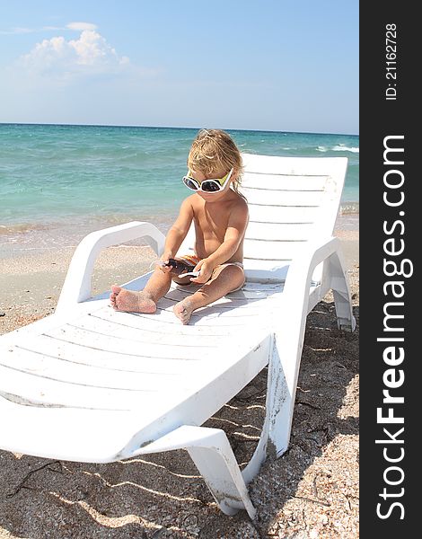 Child relaxing on beach