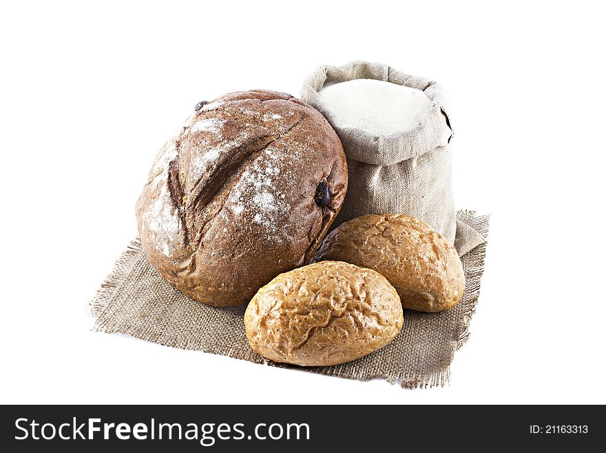 Loaves of bread isolated over white background