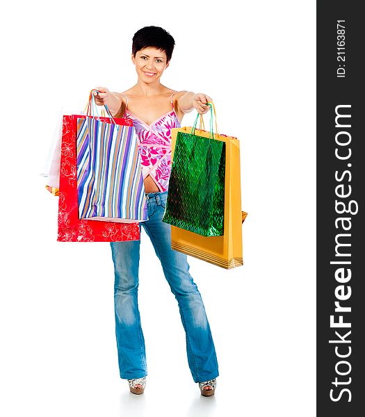 Beautiful girl with shoping bsgs isolated on a white background