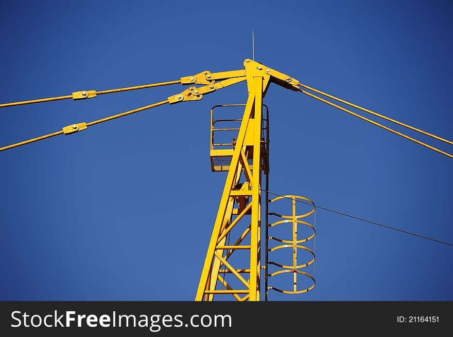 Building tower crane on the sky background