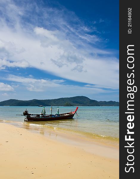 Long-tailed boat on the beach