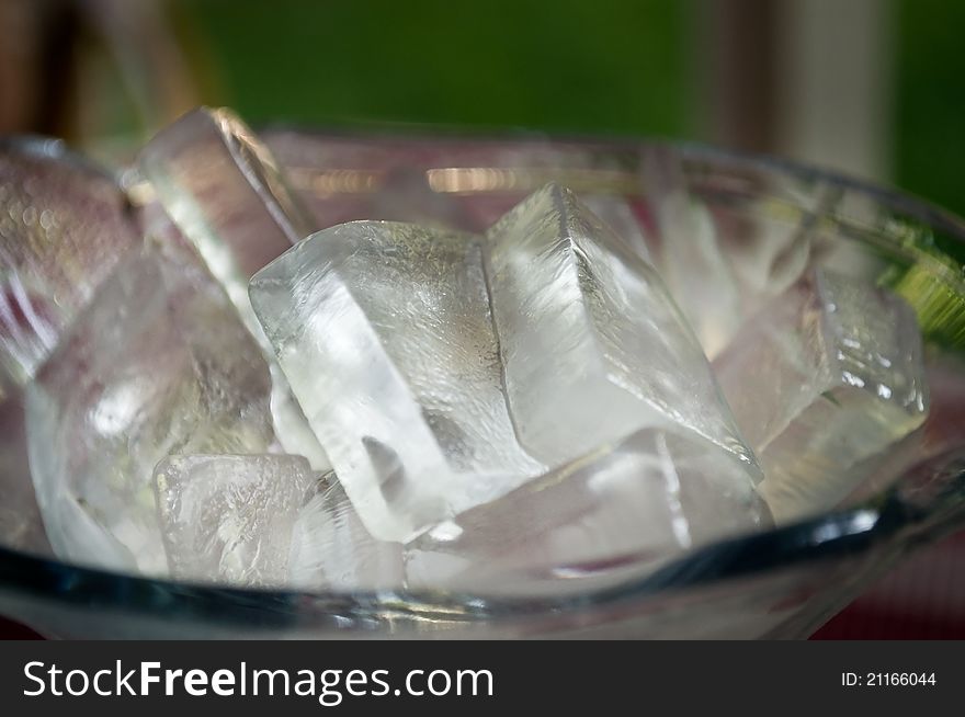 Pieces of ice in a cocktail glass. Pieces of ice in a cocktail glass