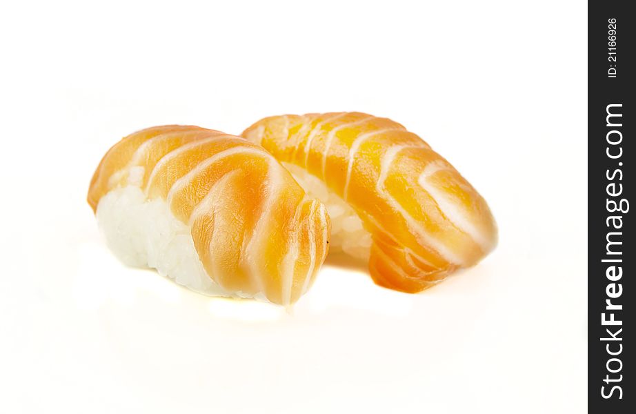 Sushi nigiri with a piece of raw salmon