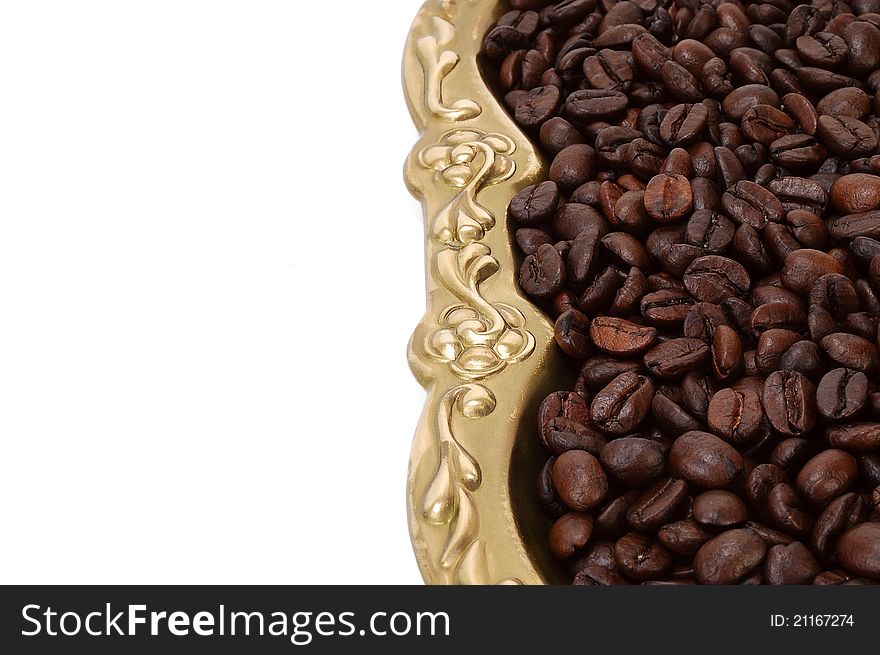 Roasted coffee beans vertically on a white background