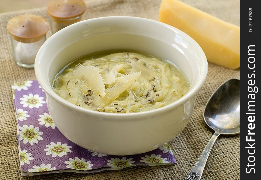 Delicious vegetable soup with cheese. Selective focus