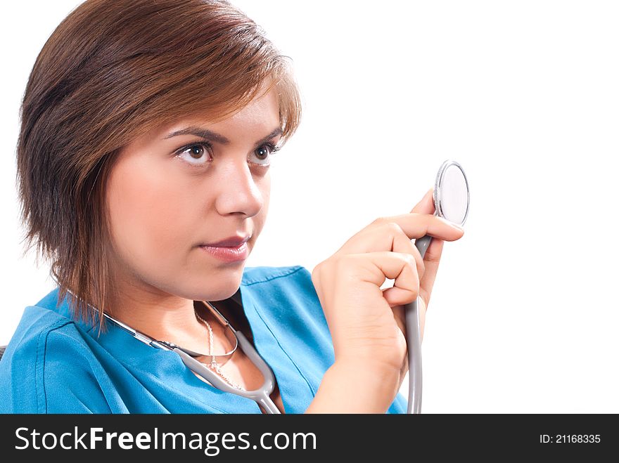 Medical doctor with stethoscope on white background