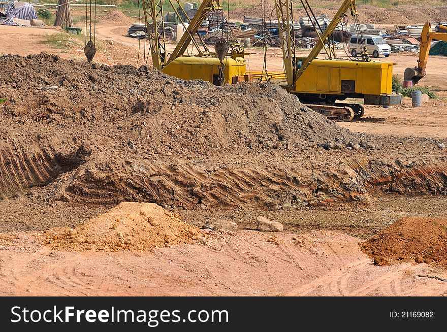 Base of construction, with excvavtor in working area. Base of construction, with excvavtor in working area.