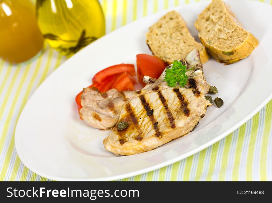 Pork Chop, Grilled ,with Salad,bun And Tomato