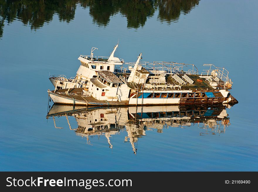 Abandoned ship in the water