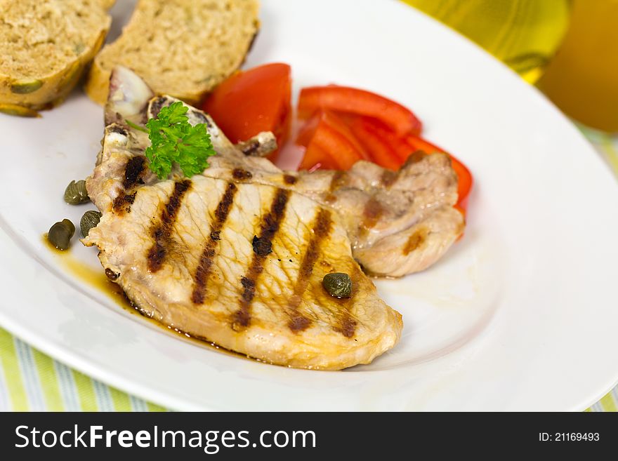 Pork Chop, Grilled ,with Salad,bun And Tomato