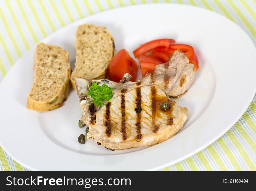 Pork Chop, Grilled ,with Salad,bun And Tomato