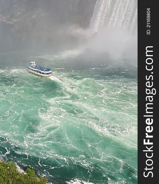 Niagara Falls ans touristic boat. Famous tourist landmark. Ontario, Canada