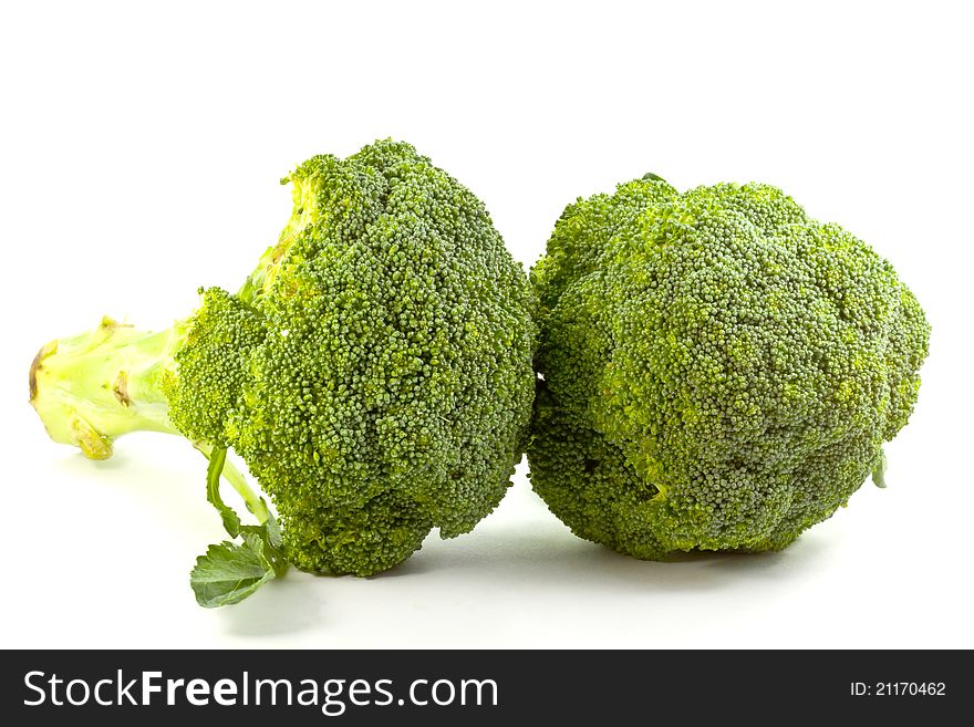 Fresh raw broccoli on white background