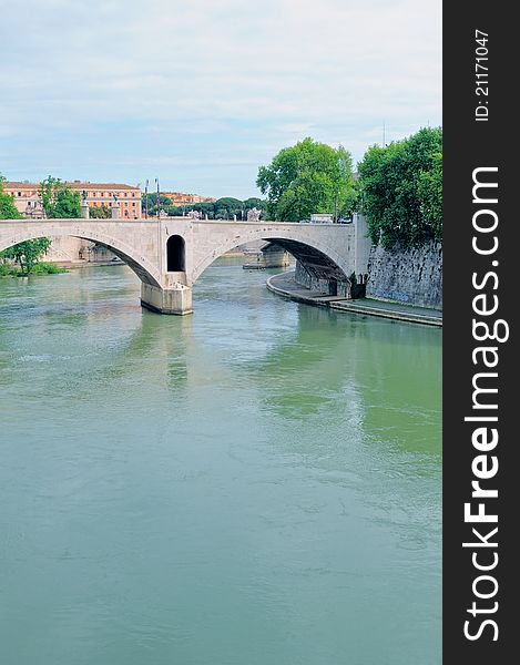 Historic bridge over the Tiber river in Rome. Italy