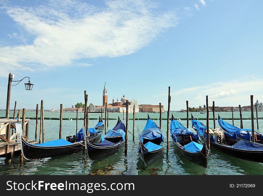 Gondolas on Grand Canal and San Giorgio Maggiore church in Venice, Italy. Gondolas on Grand Canal and San Giorgio Maggiore church in Venice, Italy.