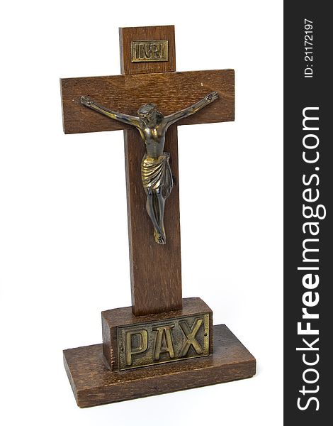 Wooden crucifix, inscribed pax, latin for peace. Wooden crucifix, inscribed pax, latin for peace