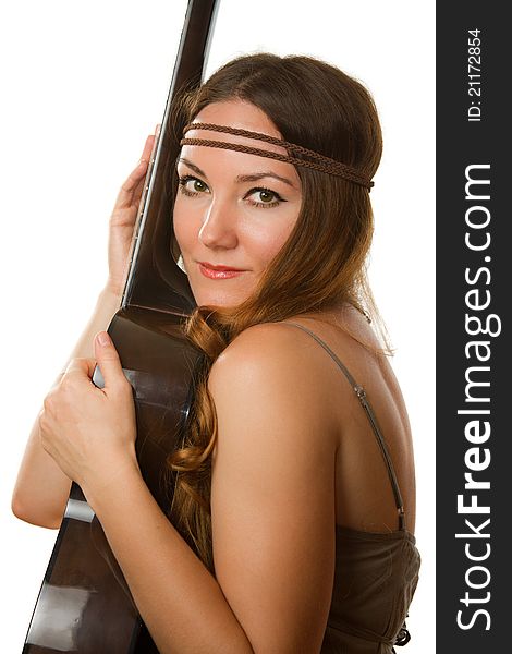 Beautiful woman with bandage on his head and a guitar on a white background. Beautiful woman with bandage on his head and a guitar on a white background