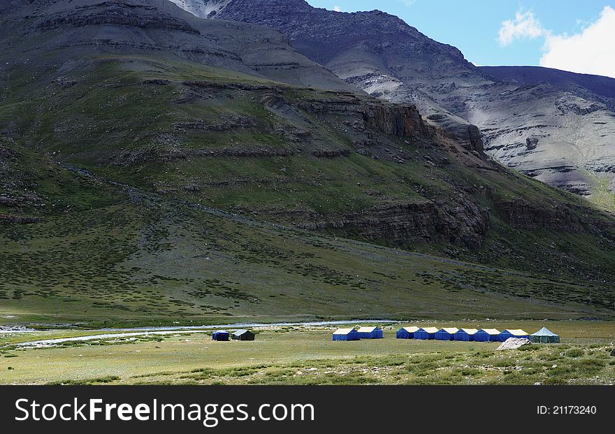 Tents under mountains