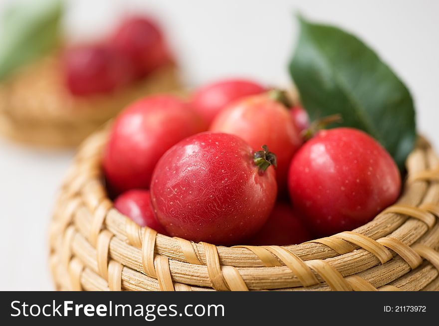 Small red apples in the basket