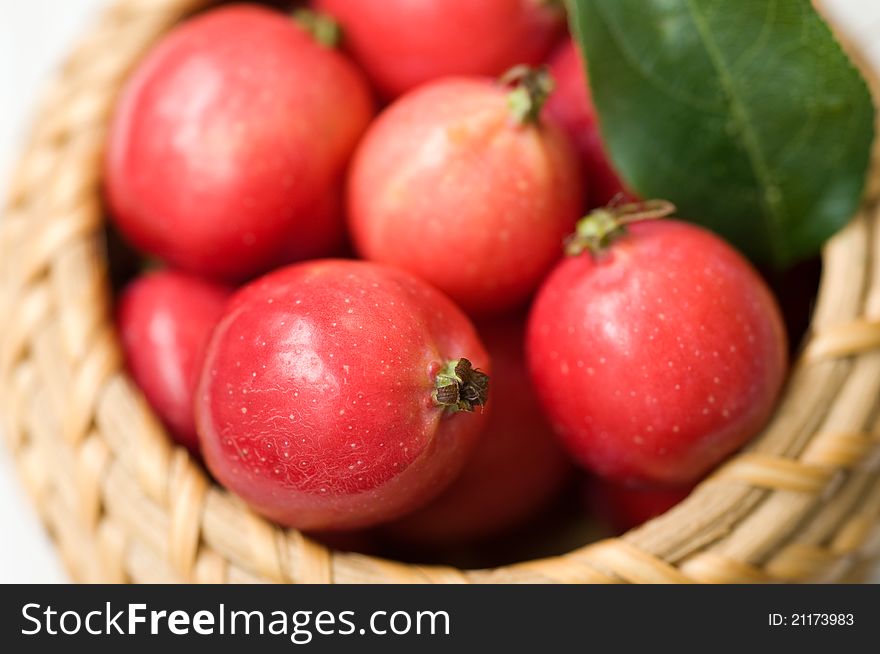 Small red apples in the basket