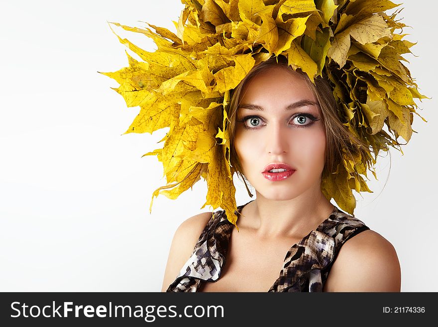 At the woman an autumn wreath on a head. At the woman an autumn wreath on a head.