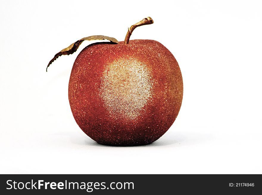 Photo of a fancy decorate apple on a white background. Photo of a fancy decorate apple on a white background