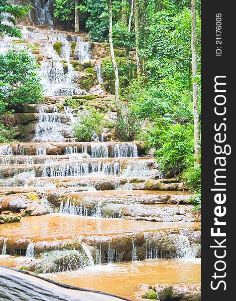 Little waterfall in Thailand has many steps. Little waterfall in Thailand has many steps.