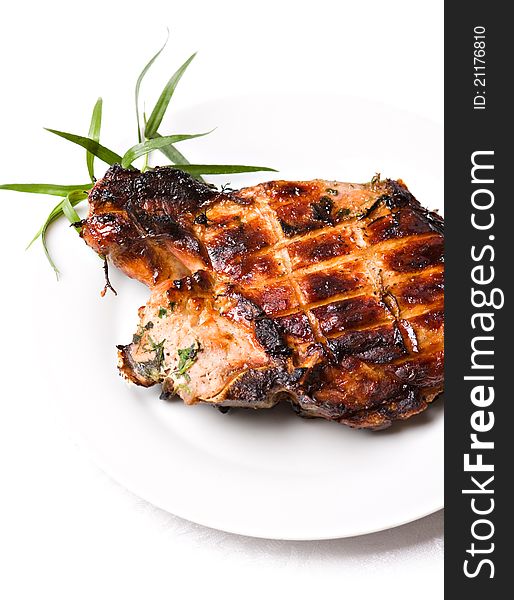 Grilled pork meat on white background